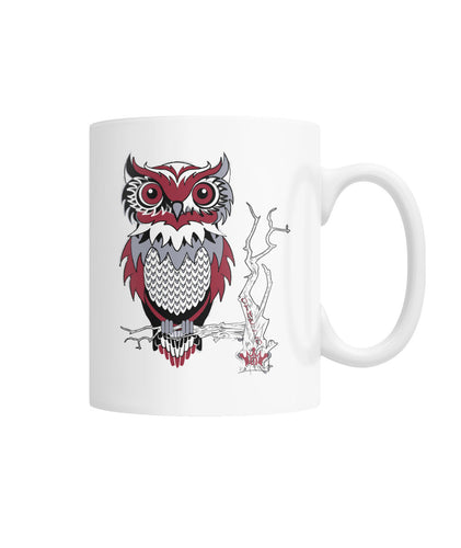 Owl Sits on a branch