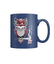 Owl Sits on a branch