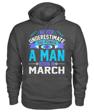 A man born in March Gildan Hoodie