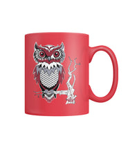 Owl Sits on a branch