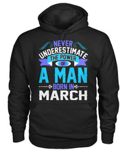 A man born in March Gildan Hoodie