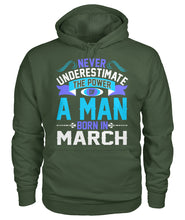 A man born in March Gildan Hoodie