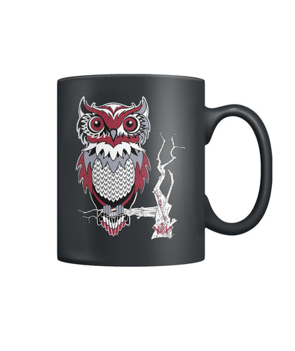 Owl Sits on a branch
